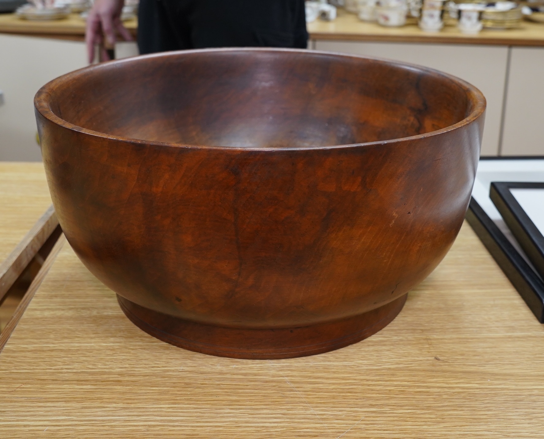 A large turned walnut bowl, carved from the solid, 38cm diameter. Condition - good